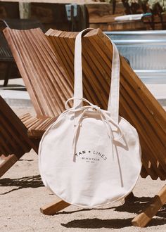 BEACH CLUB TOTE BAG - TAN + LINES by Sivan Ayla Cheap White Reusable Beach Bag, Eco-friendly Summer Beach Bag, Cheap Neutral Beach Bags, Luxury Eco-friendly Everyday Beach Bag, Cheap White Beach Bag For Day Out, Luxury Beach Bucket Tote Bag, Cheap Eco-friendly Bags For Beach Season, Cheap Eco-friendly Beach Bag For Summer, Cheap Eco-friendly Beach Bag For Beach Season