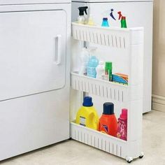 Rolling Laundry Organizer Pantry. Works well between the machines or off to the side of them. The perfect way to utilize tight spaces in your home for storage. Material : Plastic At home in your kitchen, workshop, or in-between your washer and dryer. Smoothly rolls out from in-between cabinets or shelves. The next step to a more organized you. Dimensions- 4.40 x 9.50 x 21.80 Inches Fits snugly in tight spaces - measures 29 1/4" high x 21" long x 5" wide Simple assembly is required. Sliding Storage, Diy Bathroom Storage Ideas, Laundry Room Ideas Small Space, Mobile Shelving, Diy Bathroom Storage, Laundry Room Remodel, Laundry Closet, Small Laundry Rooms, Small Laundry Room