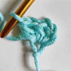 a crochet hook with yarn on it