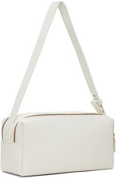 Grained leather shoulder bag in white. · Adjustable shoulder strap · Zip closures · Unlined · H4.75 x W9.5 x D4 Supplier color: White White Shoulder Bag With Gold-tone Hardware For Business, White Business Shoulder Bag With Gold-tone Hardware, White Shoulder Bag With Detachable Strap For Business, White Shoulder Bag With Adjustable Strap For Business, White Business Shoulder Bag With Adjustable Strap, White Textured Leather Crossbody Shoulder Bag, White Business Bag With Adjustable Strap, White Soft Leather Shoulder Bag For Business, Chic White Shoulder Bag For Business