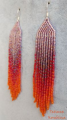 These handmade earrings are made of high-quality Czech beads and strong synthetic thread. They are elegant, fashionable, and highly versatile, suitable for everyday wear. There may be some color discrepancies which is due to the different monitor settings 100% hand made with love! Measurements: Length-about 11,5cm (4.52 inch) Width -about 2 cm (0.79 inch) Materials: Sterling silver components Czech glass beads Strong bead weaving thread Red Chandelier, Red Fringe, Orange Earrings, Abstract Floral Print, Earrings Red, Earrings Long, Seed Bead Earrings, Czech Beads, Fringe Earrings