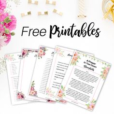 the free printables are on display next to pink flowers