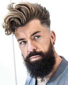 This haircut was included in 15 Long Hair Fade Hairstyles For Men That Look Effortlessly Cool. See more men's hairstyles at MensFlair.com Long Hair Fade, Best Undercut Hairstyles, Mid Fade Haircut, Long Beard Styles, Taper Fade Haircut, Tapered Haircut, Wavy Hair Men, Dark Hair With Highlights