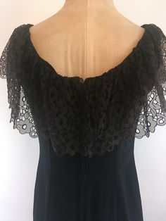 "1960's lightweight black rayon shift dress with brown lace bertha collar and sweet velvet bow at the chest zips up in the back and finishes at the top with a hook and eye. Dress is fully lined in acetate. In very good vintage condition. The only tag in the dress is a union tag Chest 36\" Waist 32\" Hips 38\" Length (top of chest to hem) 30\" Vintage garments have been previously worn and lovingly cared for, they may however have a blemish or two. Here at MadelonVintage, I try my very best to no Fitted Sleeveless Dress With Lace Collar, Retro Evening Dresses With Lace Trim, Vintage Sleeveless Dress With Lace Collar, Bertha Collar, Eye Dress, Cotton Kaftan, Skirt Suit Set, Velvet Bow, Red Wool