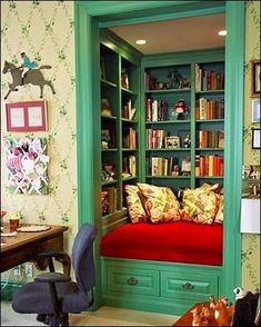 a green bookcase filled with lots of books