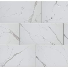 white marble tiles with different angles and sizes