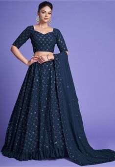 Faux Georgette Lehenga in Navy Blue This attire with Faux Crepe Lining is Enhanced with Resham, Zari, Sequins and Lace Work Available with an Unstitched Faux Georgette Choli in Navy Blue and a Faux Georgette Dupatta in Navy Blue The Semi-Stitched Lehenga Waist and Hips are Customizable from 28 to 38 inches and from 32 to 46 inches respectively and Lehenga Length is 42 inches Do Note: Accessories shown in the image are for presentation purposes only. (Slight variation in actual color vs. image i Teal Blue Blouse, Navy Blue Lehenga, Flared Lehenga, Bridesmaid Lehenga, Simple Lehenga, Georgette Lehenga, Lehnga Dress, Blue Lehenga, Teal Blue Color