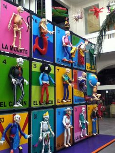 there are many toy figures on display in the mall