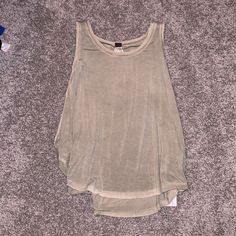 Free People Tank Top - Green Size Xs Nwt. The Cut On The Side Of The Shirt Goes Low (Second Photo) Basic Khaki Summer Tops, Basic Khaki Tops For Summer, Trendy Khaki Tank Top For Spring, Casual Beige Tank Top For Everyday, Fitted Khaki Tank Top Casual, Fitted Casual Khaki Tank Top, Casual Khaki Cotton Tank Top, Beige Casual Relaxed Fit Tank Top, Casual Beige Relaxed Fit Tank Top