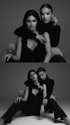 two women sitting next to each other in black and white photo boothes, one with her arms around the other's neck