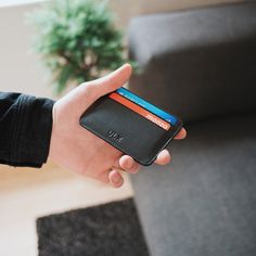 A slim and minimalist card holder made from genuine leather. Identical design on both sides. Has two slots on both sides with a middle slot, totaling five slots. Genuine leather Size: 105x75mm Black Bedroom Decor, Minimalist Card, Minimalist Cards, Random Inspiration, Leather Card Holder, Inspirational Images, Card Holder Leather, Both Sides, Slots