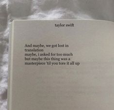 an open book with the words taylor swift and maybe, we got lost in translation