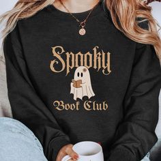 Get ready for spooky season with our Ghost Reading Books Sweater! This cozy Bookish Halloween Sweatshirt is the perfect Halloween Teacher Gift or Librarian Halloween Hoodie. Featuring a cute Ghost Crewneck design, it's ideal for any book lover this fall! ABOUT OUR Funny Book Sweater! 👻 Unisex Sweatshirt - 50% cotton and 50% polyester. - Soft cotton and quality print make users fall in love with it over and over again. - These t-shirts have-ribbed knit collars to bolster shaping. - Printed and s Spooky Black Halloween Sweatshirt, Horror Long Sleeve Sweatshirt For Halloween, Black Character Print Sweatshirt For Fall, Halloween Crew Neck Hoodie With Cartoon Print, Halloween Hoodie With Cartoon Print And Crew Neck, Halloween Cartoon Print Crew Neck Hoodie, Black Horror-themed Sweatshirt For Fall, Black Horror Sweatshirt For Fall, Spooky Letter Print Sweatshirt For Winter