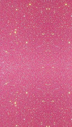 pink and gold glitter background with lots of small dots on the bottom half of it