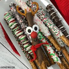 a white plate topped with pretzels and candy canes