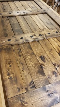 36x84 Wood Barn Door - Barn door is finished in Provincial stain and wax sealed.  Embellished with iron clavos (nail heads) add character.  Front pull on door NOT included. Wood Barn Doors, Custom Barn Doors, Wood Barn Door, Interior Sliding Barn Doors, Barn Door Designs, Barn Door Kit, Rustic Barn Door, Wood Barn, Double Barn Doors