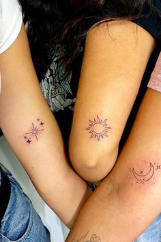 two people with matching tattoos on their arms