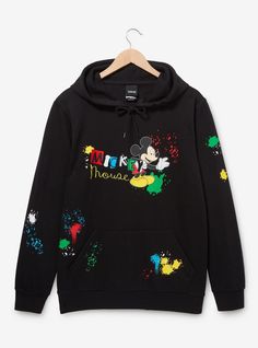 Add some color to your next Disney Parks look with this Mickey Mouse-inspired hoodie! Featuring a portrait of the cartoon mouse beside embroidered lettering of his name  this jacket includes paint splatter details along the front and back. With a front pocket and drawstring hood  this sweatshirt is perfect for fans of Mickey.A BoxLunch Exclusive!60% cotton; 40% recycled polyesterListed in unisex sizesWash cold with like colors; dry lowDo not iron over printImported Disney Painting, Mouse Paint, Embroidered Lettering, Disney Paintings, Disney Moana, The Cartoon, Paint Splatter, Disney Mickey Mouse, Disney Parks