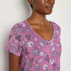 Sleep in style in this Jaclyn women's nightshirt designed with a V-neckline, short cap sleeves, a flowy silhouette, and a fun print. It's made from a ribbed knit fabric ensuring comfortable all-night wear. Neckline: V NeckSleeve Length: Short SleeveSleeve Style: Cape SleeveApparel Length: 36 InchesFiber Content: 95% Polyester, 5% SpandexFabric Description: Rib KnitCare: Machine WashCountry of Origin: Imported Cotton Floral Print V-neck Sleepwear, Casual Floral Print Nightgown For Pajama Party, Casual Short Sleeve Nightgown For Pajama Party, Casual Nightgown For Pajama Party In Spring, Cotton V-neck Sleepwear With Floral Print, Relaxed Fit Floral Print V-neck Sleepwear, V-neck Sleepwear, Spring Cotton V-neck Nightgown, Spring Cotton V-neck Sleepwear