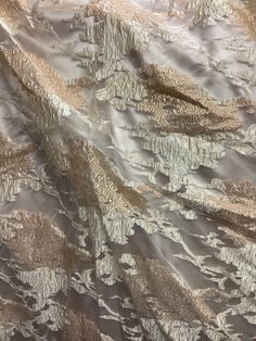 "THIS IS luxurious mulberry 100% organza jacquard brocade design in Italy COLOR: Champagne gold WIDTH :60\" inch made in Italy LENGHTE ; SOLD EVERY YARD MULTIPLE YARDS ARE ONE CONTINUOUS CUT CARE : DRY CLEAN ONLY NEED MORE THAN 20 YRDS AND UP PLEASE SEND US EMIL AND WE CAN ACCOMMODATE YOU SO YOU CAN COMPLETE YOUR PARTICULAR PROJECT DISCLAIMER : WE HAVE MADE AN AFFORT TO PROVIDE FABRICS IMAGES THAT COLSELY REPRESENT THE FABRICS HOWEVER DUE TO ALL THE POSSIBLE VARIANTS (e,g,light source monitor qu Cream Embroidered Fabric For Festive Formal Occasions, Festive Cream Embroidered Fabric For Formal Occasions, Festive Jacquard Embroidered Fabric For Wedding, Elegant Jacquard Fabric For Evening, Gold Embroidered Fabric For Festive Evening, Elegant Embroidered Organza Fabric For Parties, Elegant Gold Organza Embroidered Fabric, Elegant Gold Embroidered Organza Fabric, Elegant Pink Embroidered Fabric For Festive Occasions