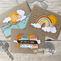 three different cards with clouds and rainbows on them, one is for the crafty o'clock