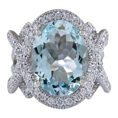 Introducing our breathtaking 14K White Gold Diamond Ring, a true embodiment of elegance and sophistication. Weighing 14.4 grams and meticulously stamped with 14K White Gold, this remarkable ring features a magnificent 8.91 Carat Aquamarine centerpiece, measuring 16.00x12.00 mm. Encircling the Aquamarine are dazzling diamonds weighing 2.10 Carats, boasting a stunning F-G color and VS2-SI1 clarity. With a face measuring 21.30x17.50 mm, this ring is a timeless masterpiece that exudes opulence and g 14k White Gold Diamond Ring, Gold Cocktail Ring, Aquamarine Jewelry, Diamond Cocktail Rings, Gold Diamond Ring, White Gold Diamond Rings, Pretty Rings, Natural Aquamarine, Gold Diamond Rings