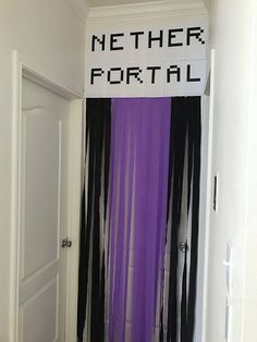 there is a purple and black curtain in the hallway