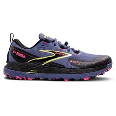 the brooks women's trail running shoe is shown in blue and black with pink accents