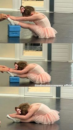 a woman in a pink dress sitting on the floor with her hands over her face