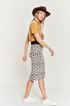 Unleash your wild side with our Clara Animal Print Skirt. Made from cozy sweater material, these skirts not only make a statement with their fun animal print, but also keep you warm and comfortable. Perfect for a playful and stylish look on any occasion. Model is 5'9" wearing a small Casual Leopard Print Skirt For Day Out, Leopard Print Skirt For A Day Out, Casual Leopard Print Skirt For Fall, Casual Leopard Print Midi Skirt Bottoms, Casual Leopard Print Midi Skirt, Trendy Skirt With Elastic Waistband, Casual Leopard Print Skirt For Spring, Leopard Print Lined Bottoms With Relaxed Fit, Casual Leopard Print Pencil Skirt