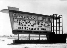 an old theater sign with the words edward's drive in