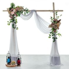 an altar decorated with flowers and greenery