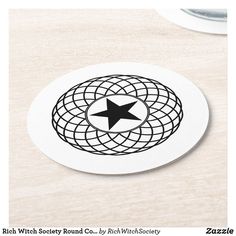 a white plate with a black star on it