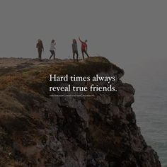 three people standing on top of a cliff with the words, hard times always reveal true friends