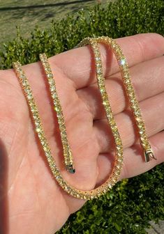 "Brilliant and Icy women's or mens 3mm tennis chains. Solid 925 sterling silver. 15-25ct fancy canary yellow simulated diamonds (CZ) Vivid yellow color 3mm thick 16\", 18\", 20\", 22\", 24\" and 28\" lengths available 21-33 grams depending on length Chains look great worn alone or with a pendant" Gold Iced Out Round Tennis Necklace, Gold Iced-out Tennis Necklace, Canary Diamond, Horseshoe Ring, Diamond Tennis Necklace, Canary Yellow, Diamond Chain, Tennis Necklace, Outfits Men