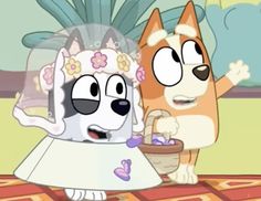 two dogs dressed up as bride and groom in cartoon style clothing, one holding a basket with flowers on it