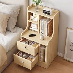 a bed room with a neatly made bed and a book shelf next to a nightstand