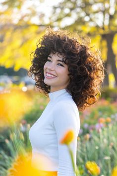 Dive into the beauty of curly hairstyles featuring a fabulous Afro! This medium-length look is effortlessly chic and perfect for showcasing your unique curls. The voluminous shape adds excitement and dimension, making it a head-turner for any occasion. Style it with curtain bangs for an extra touch of flair. Embrace your curls and let your Afro shine! #curlyhairstyles #Afro Natural Afro, Let It Be