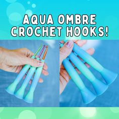 there are four blue crochet hooks being held by two hands with the words aqua ombre crochet hooks