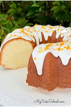 a bundt cake with white frosting and orange sprinkles on top