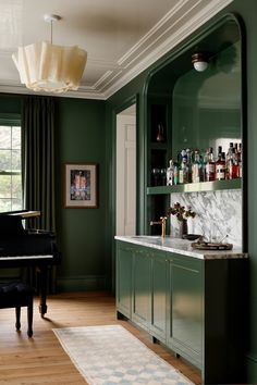 a living room filled with furniture and a piano