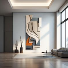 a modern living room with large windows and artwork on the wall, including an abstract painting