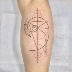 a person with a tattoo on their leg that has lines and dots all over it