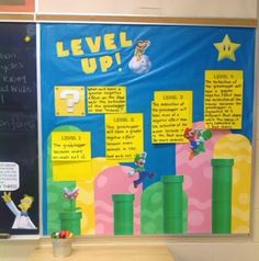 a bulletin board with the words level up written on it in front of a classroom desk