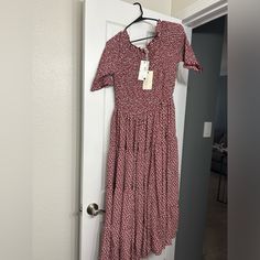 Nwt Burgundy Colored Midi Dress With White Floral Print. Size Large. From Dm Fashion Boutique. Too Part Is Smocked Burgundy Color, Fashion Boutique, Smocking, Red White, Red And White, Colorful Dresses, Floral Print, Floral Prints, Midi Dress