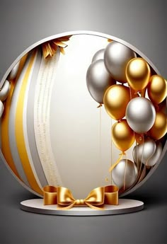 an image of balloons with gold ribbon around them on a white plate and gray background