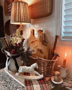 a kitchen counter topped with lots of cooking utensils