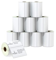 several rolls of white thermal paper are stacked on top of each other