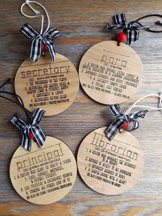 four personalized wooden christmas ornaments with ribbons