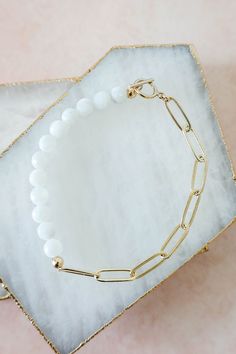 The best of both worlds, part beaded part paperclip chain. This bracelet is handcrafted with natural Moonstone beads and our favorite paperclip chain with toggle clasp closure.  Elevate your stack with the perfect duo.  6mm natural Moonstone beads 18k Gold Filled Water Resistant Tarnish Resistant Hypoallergenic Nickel Free Moonstone Bracelet, Moonstone Beads, Vermeil Jewelry, Bracelet Beaded, Solid Gold Jewelry, Timeless Jewelry, Jewelry For Her, Bracelet Gold, Toggle Clasp